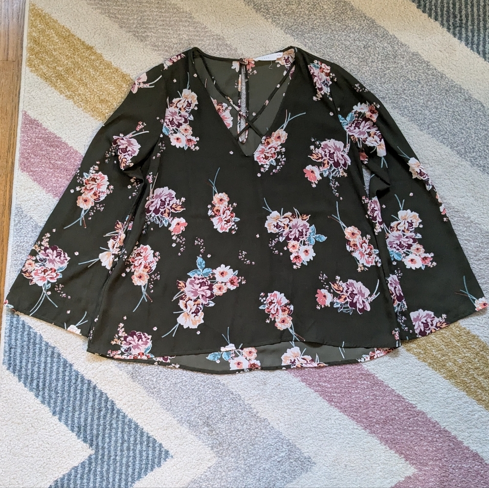 Lush floral top with wide bell sleeves